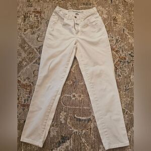 Girbaud jeans sz 7/8. Please see pics for tiny spots on bottom of legs